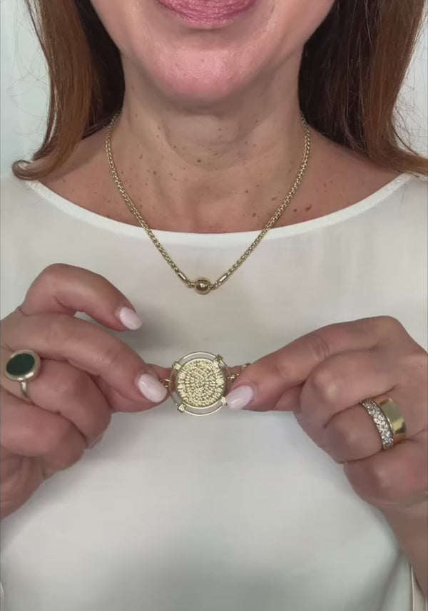 Maria Nicola: Clicks the Grecian coin pendant onto the short wheat chain, then adds the mini wheat connectors either side to drop it lower.